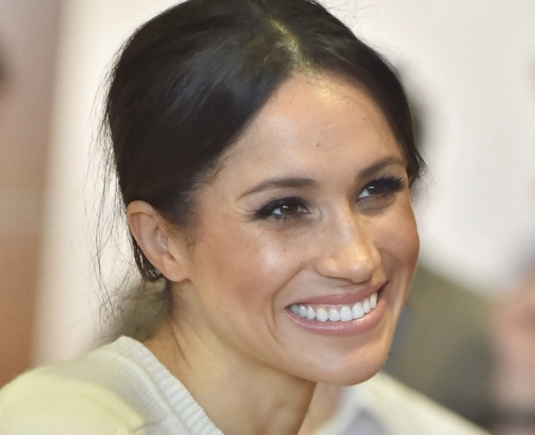 meghan markle fake smile british royal family