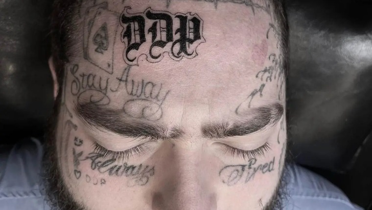 Post Malone Adds Another Face Tattoo, This Time It's His Daughter's Initials On His Forehead