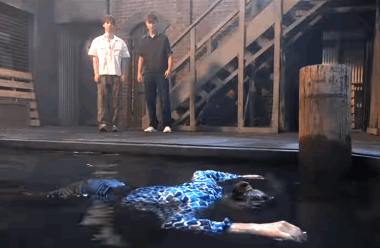 Danny and Rocco find the judge floating in the harbor